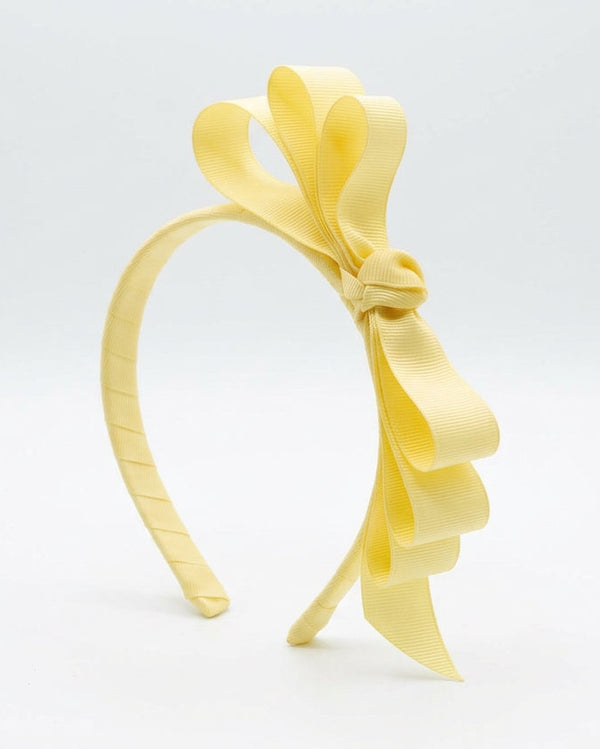 Cintillo con Lazo Amarillo - Tienda Cristinita